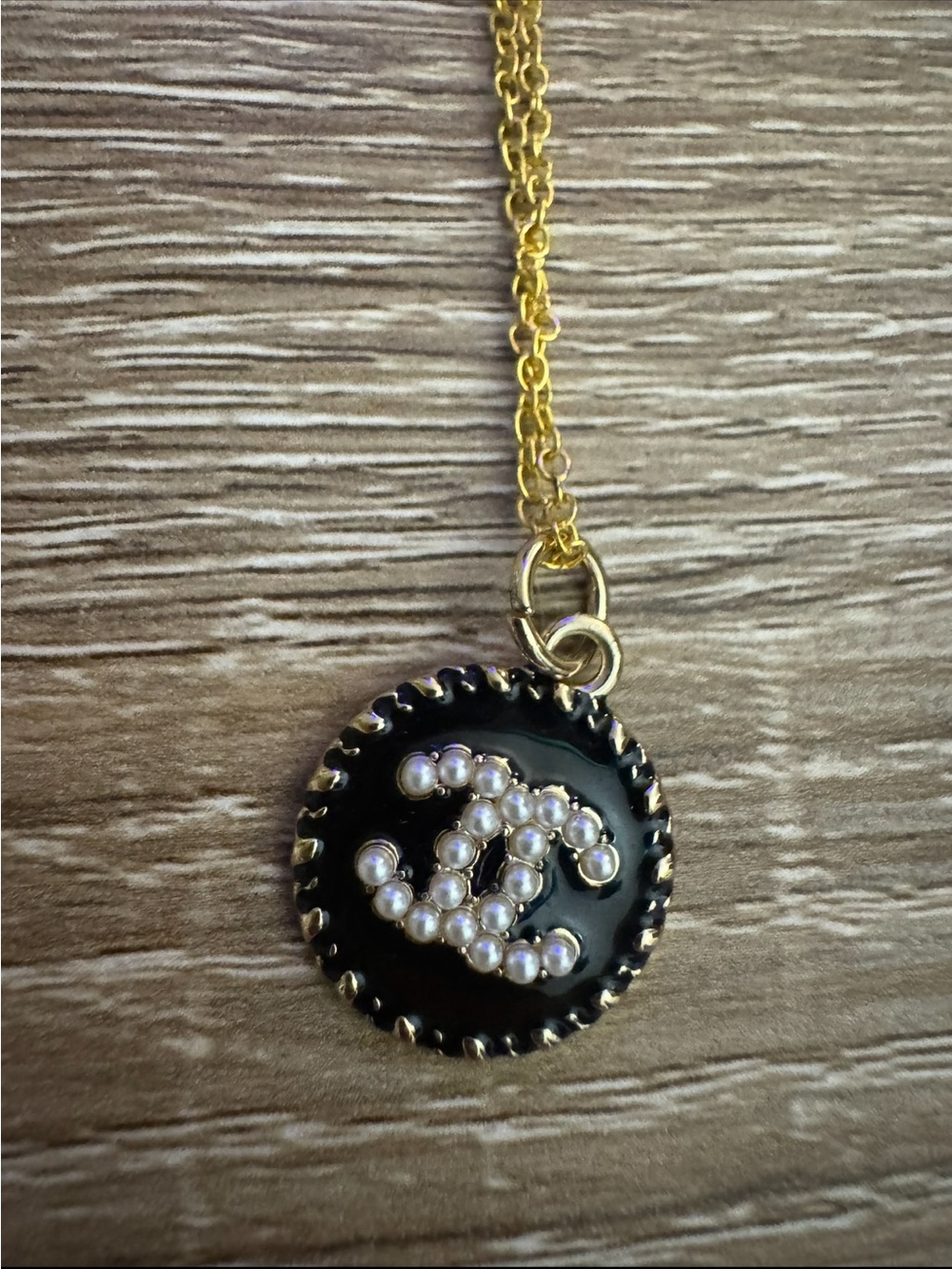 Classic Black and Gold Pearl Logo Pendant Necklace